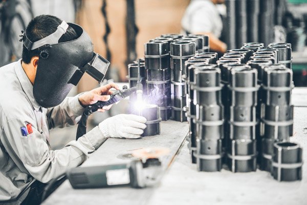 welder welding steel objects